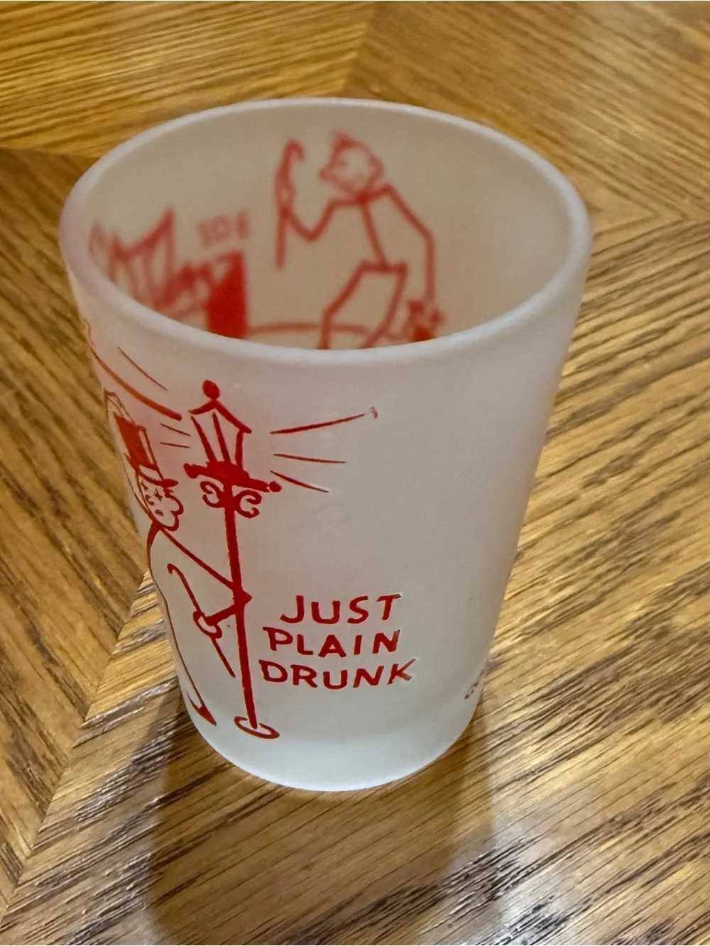 Vintage White shot glass with Red Gentleman Graphic “ Just Plain Drunk